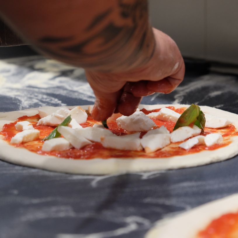 Flavour-led gluten free savoury pizza cooked from scratch